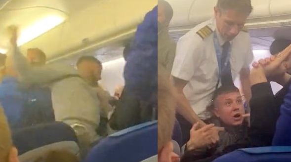 Grofgebekte kerel krijgt pakje rammel op vliegtuig